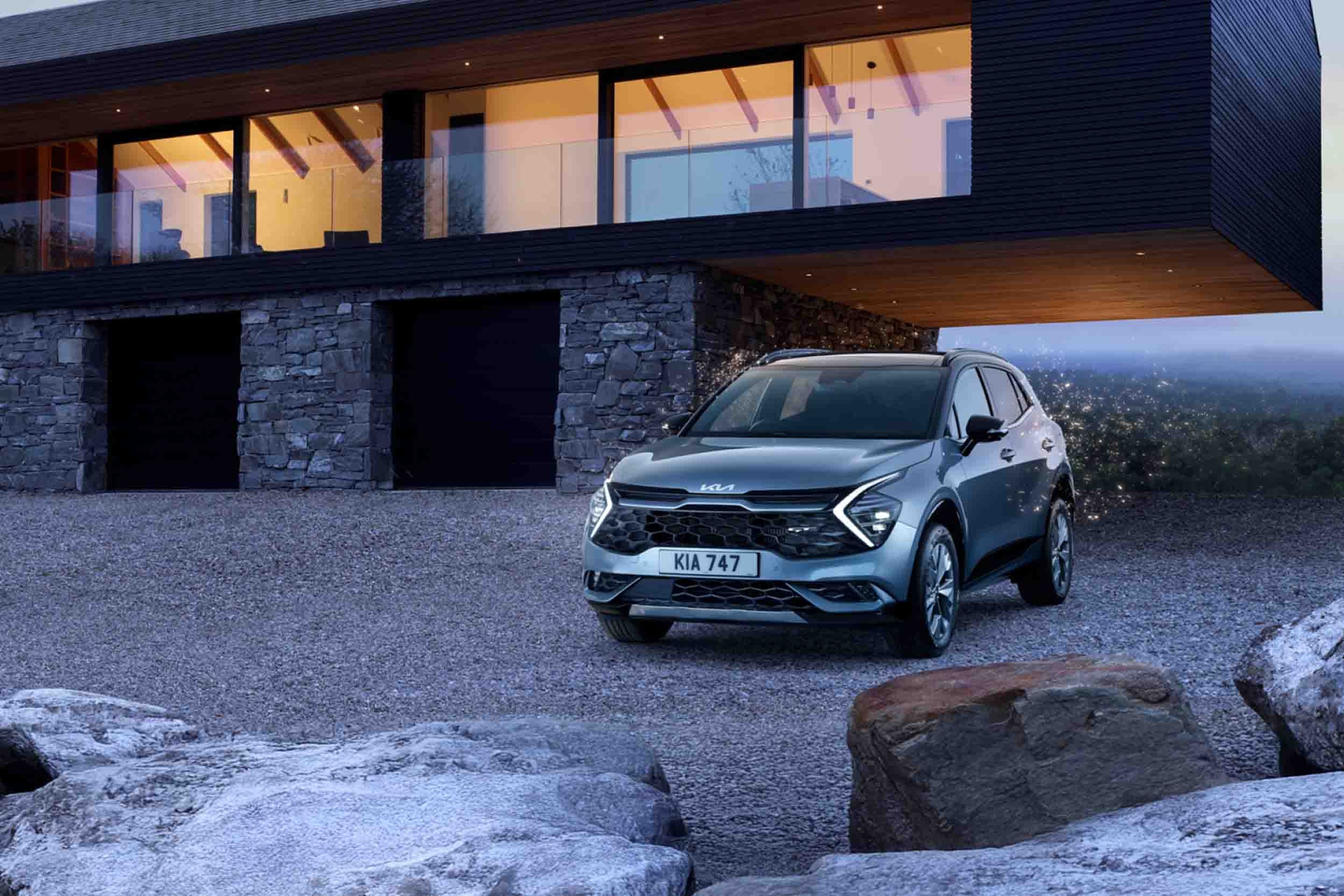 Silver Kia Sportage Exterior Front Static Outside Home