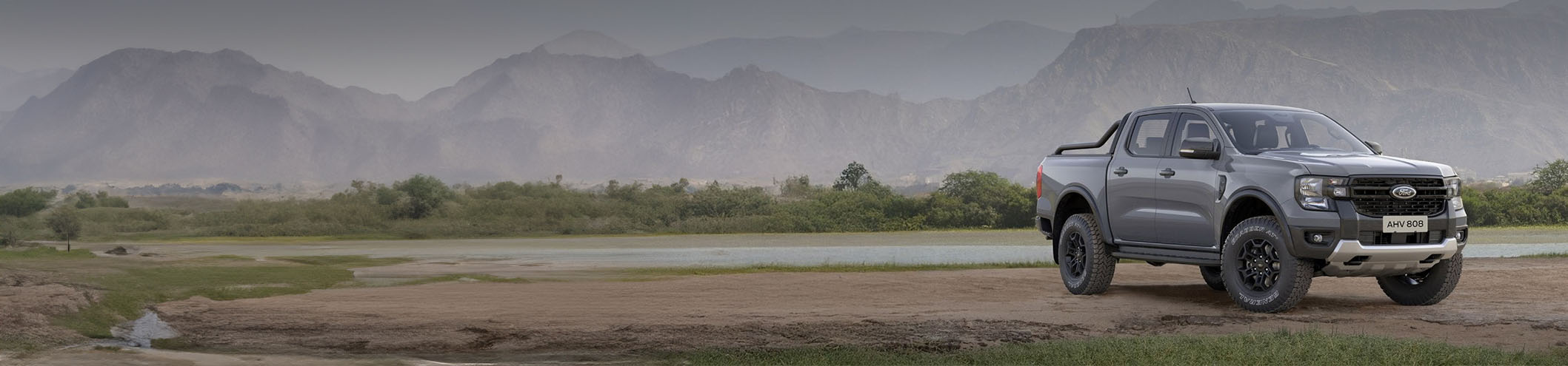 Grey Ford Ranger Exterior Front Static in Mountain Range